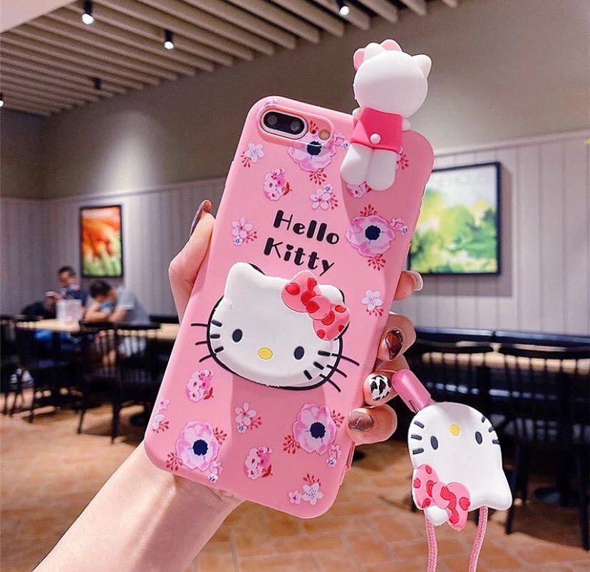 Hello kitty case with toy and pop holder